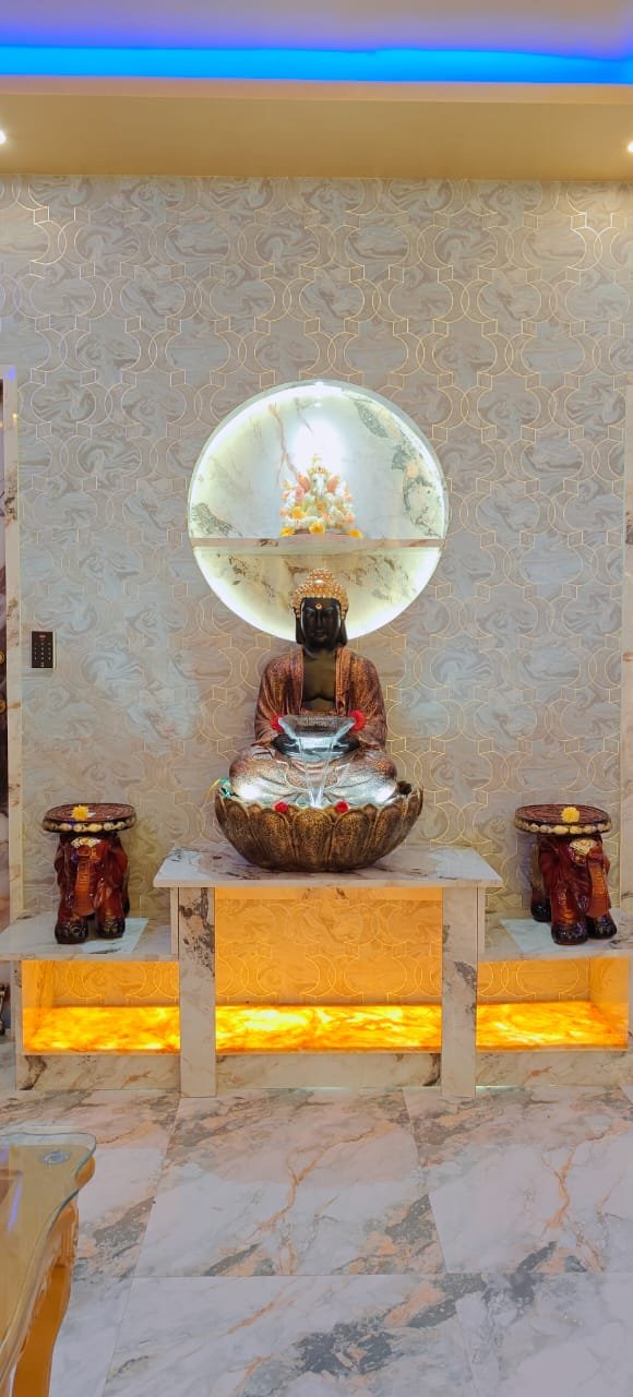 Dream Premium Spa entrance in Kaikondrahalli, Bengaluru — Buddha fountain with marble floors and golden ambient lighting