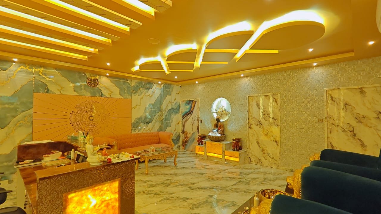 Dream Premium Spa treatment lounge in Bengaluru — warm gold lighting with elegant damask walls